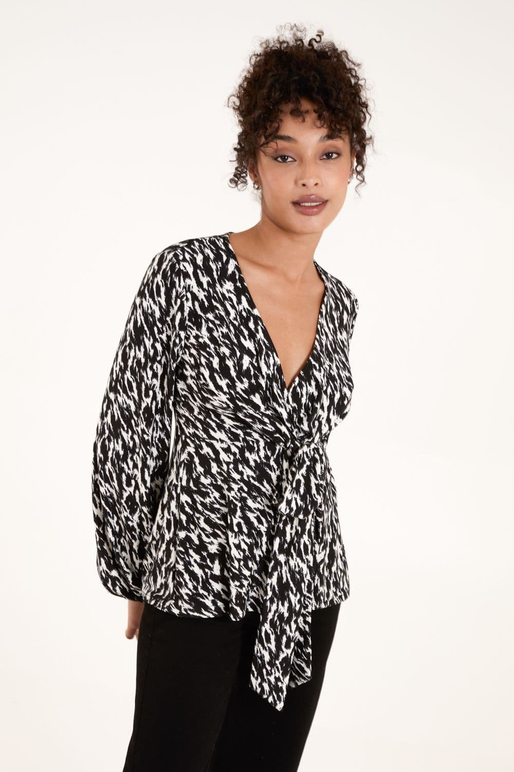 Blue Vanilla Women's Wrap Front Tie Back Top in Black