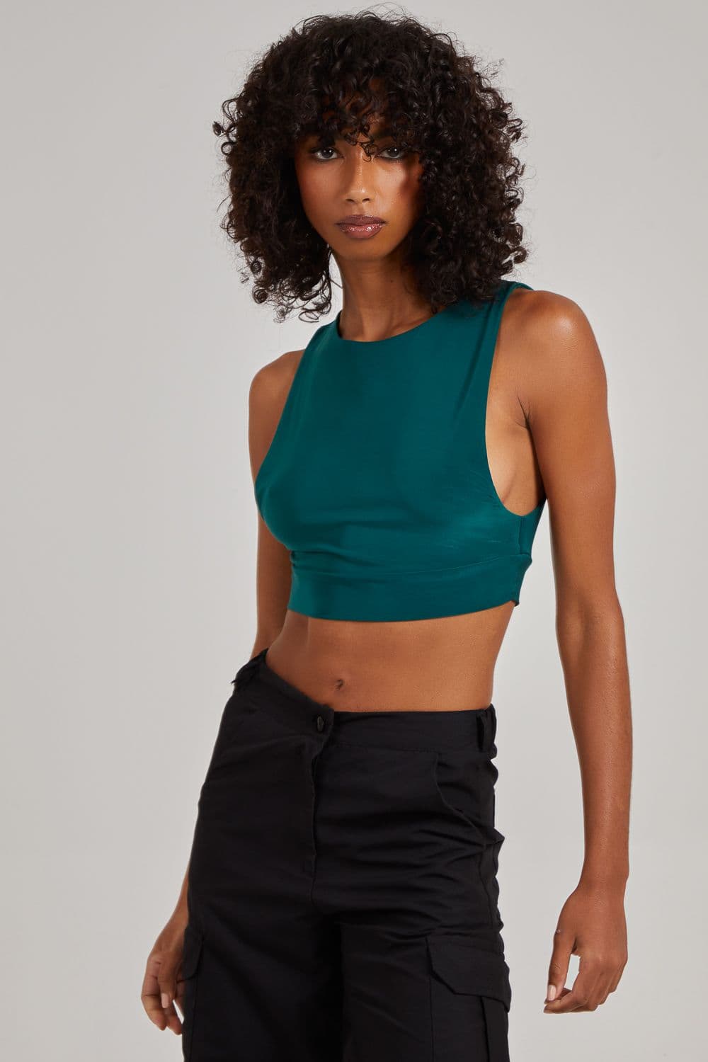 Pink Vanilla Women's Sleeveless Slinky Crop Top in Bottle Green