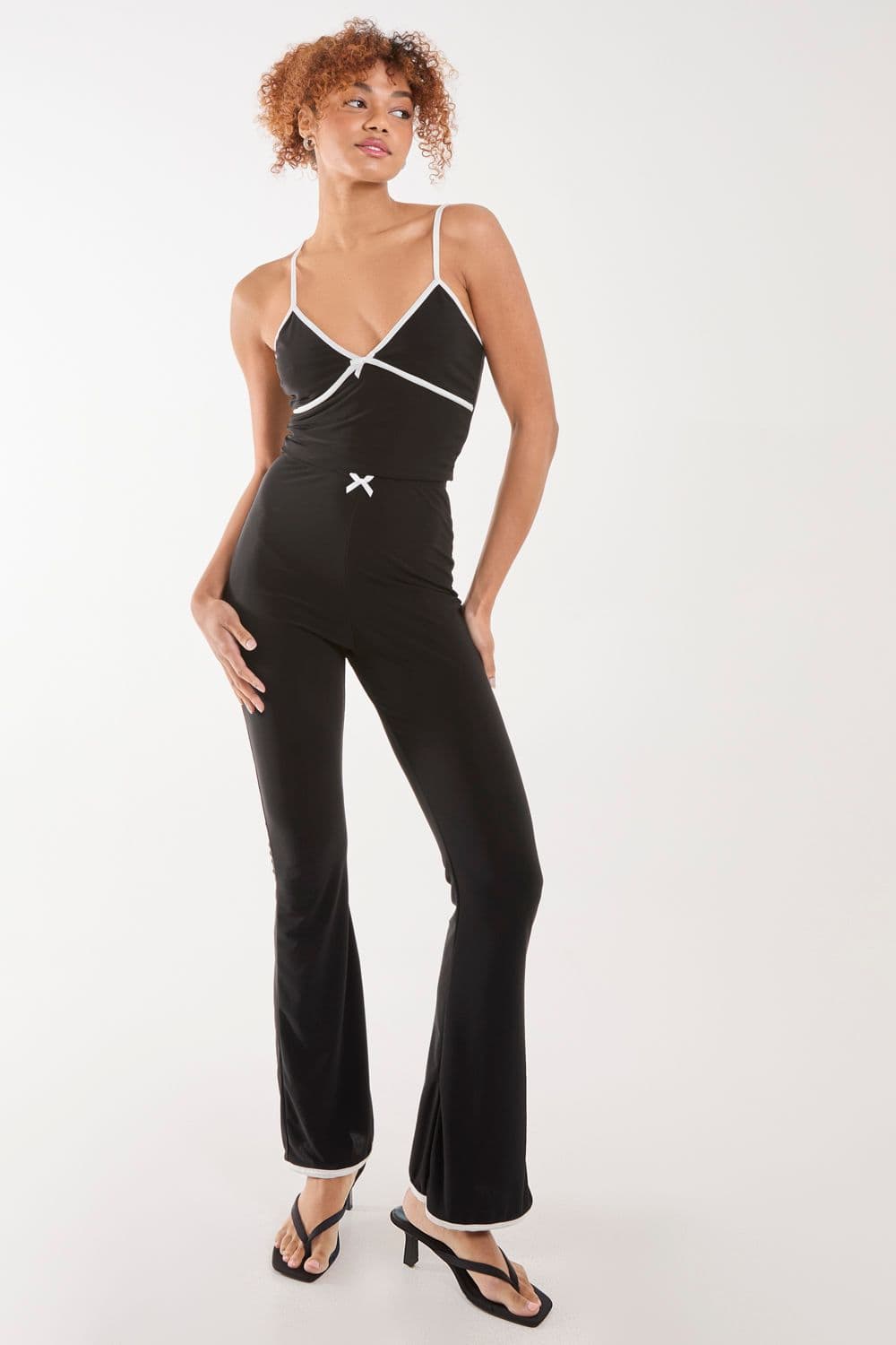 Pink Vanilla Women's High Waisted Bow Detail Piping Flares in Black